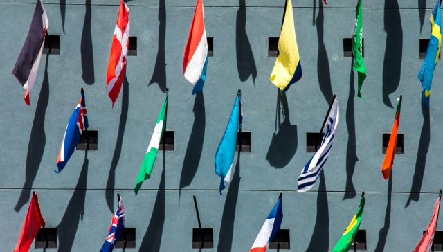 International flags representing global immigration opportunities and U.S. immigration pathways
