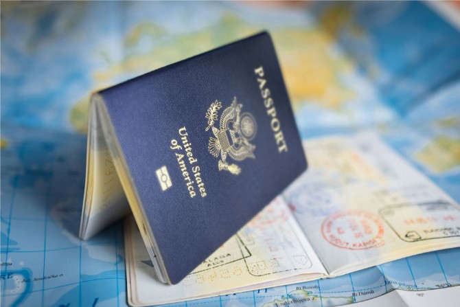 U.S. passport representing the difference between the O-1A visa and EB-1A green card for extraordinary ability professionals