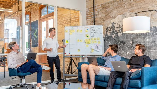 Startup founders discussing business strategy and planning